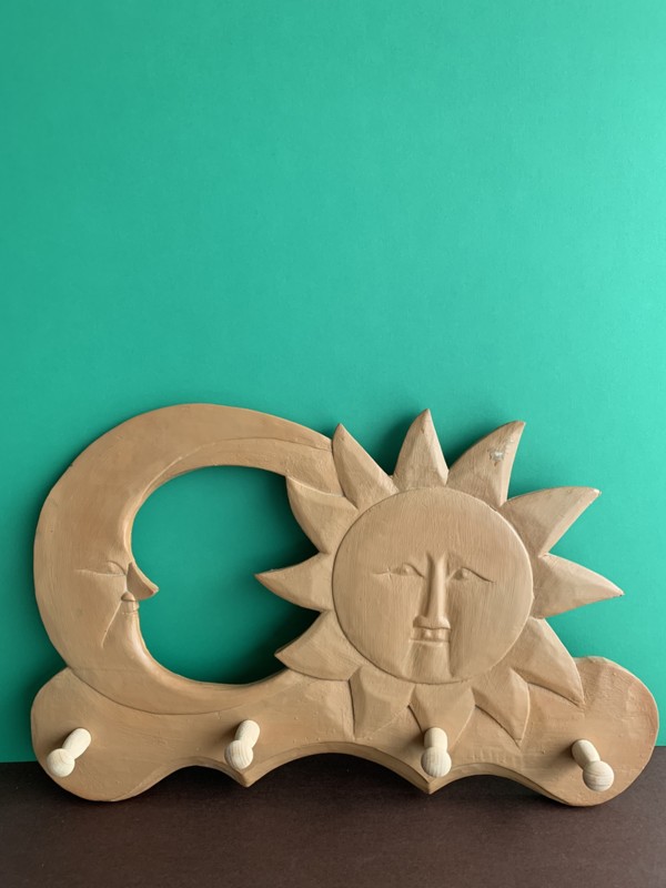 Sun and moon coat rack